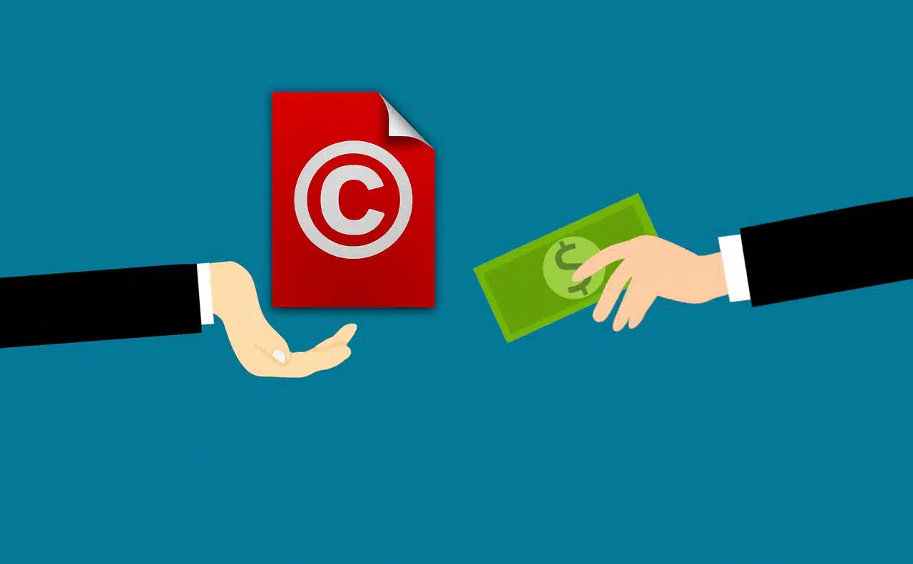 Hands exchanging money for copyright document, illustrating Business License Guide in the UK