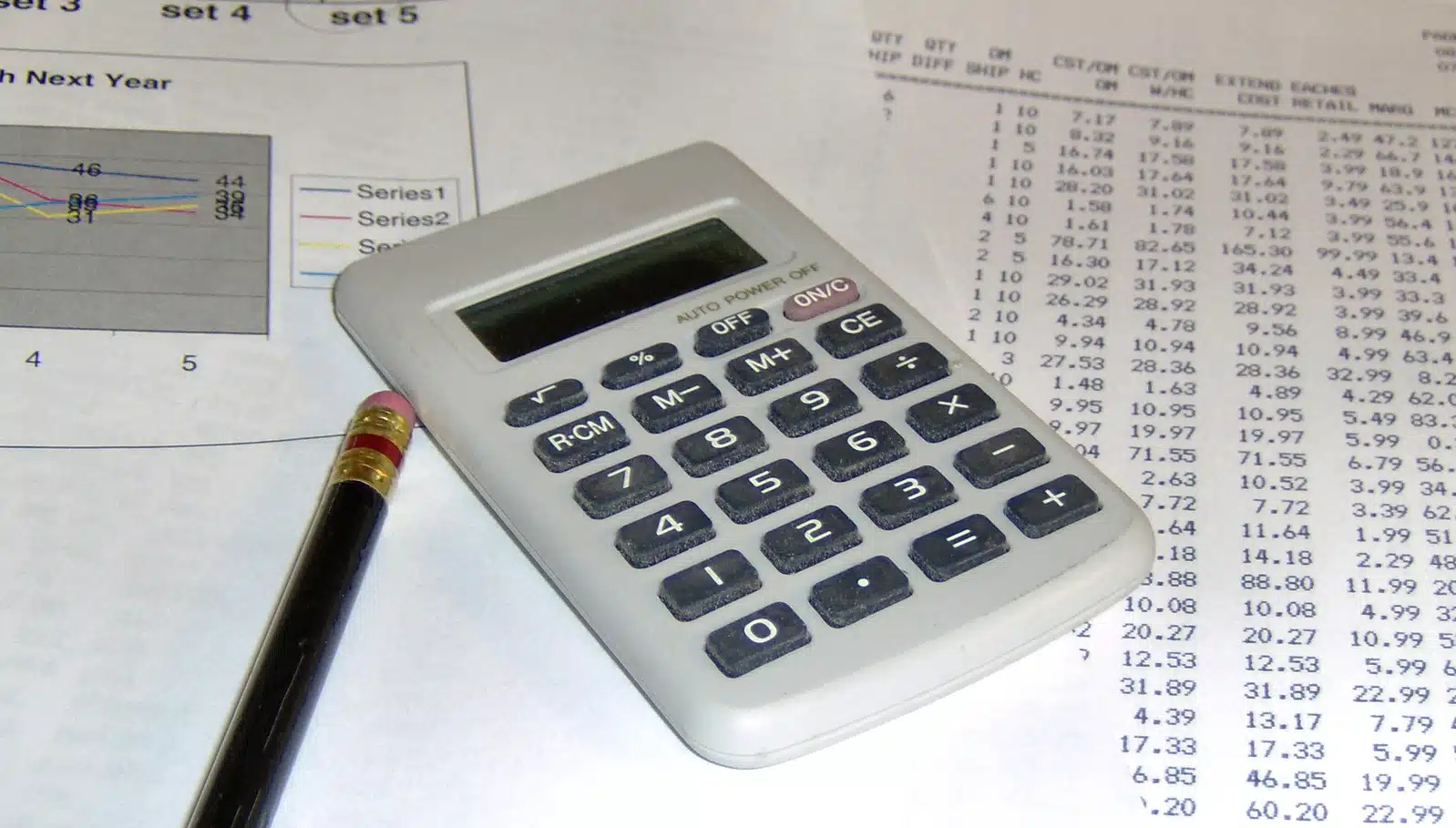 Calculator and pencil on financial documents for tax return tips article